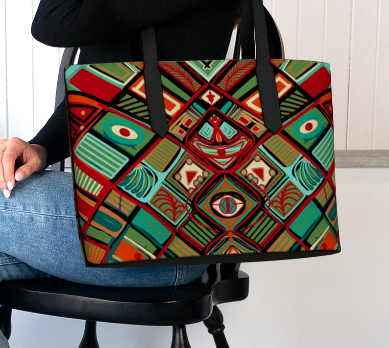 Person holding a colorful patterned bag in a room with plants and candles.