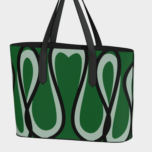 Green tote bag with abstract pattern on a light gray background
