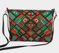 Multicolored patterned handbag with a strap on a light gray background