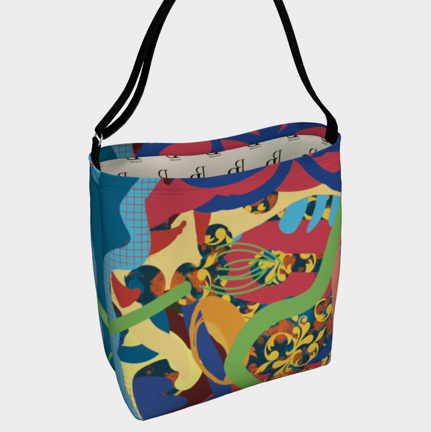 Colorful patterned bag with a black strap on a light gray background