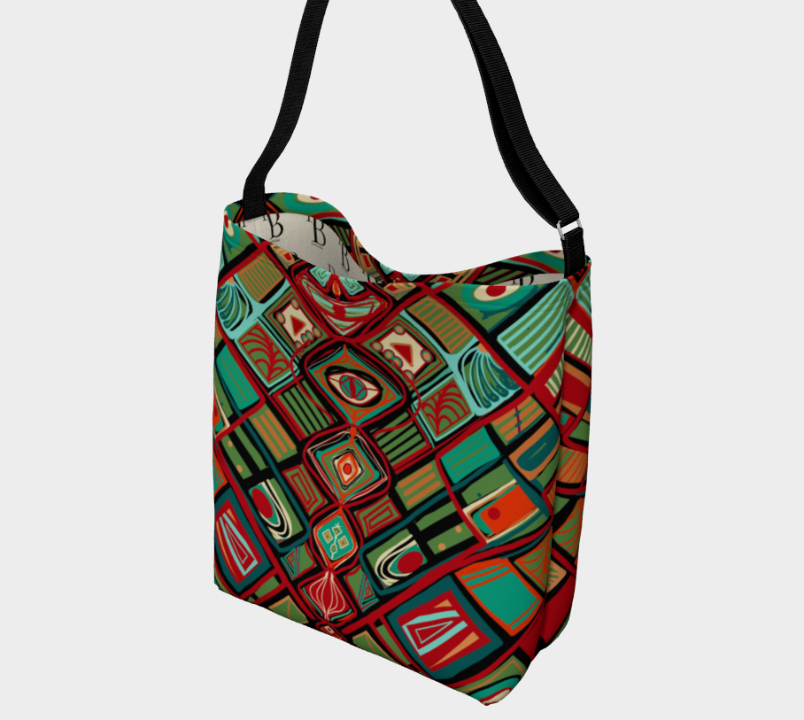 Colorful patterned bag with a strap on a light gray background